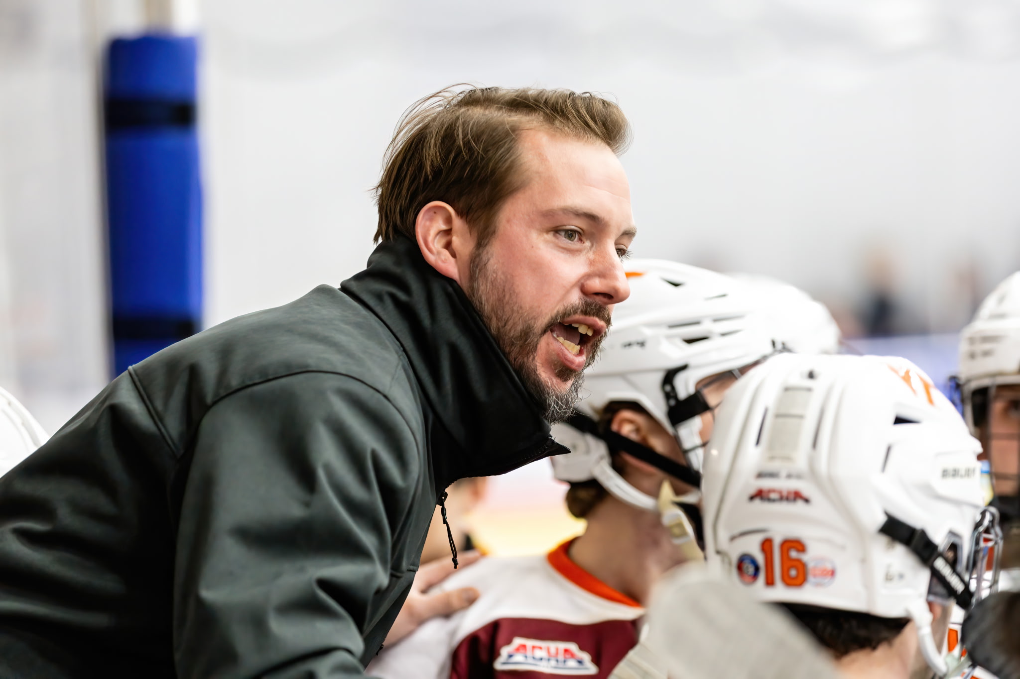 Colin Milford at the Virginia Tech hockey bench