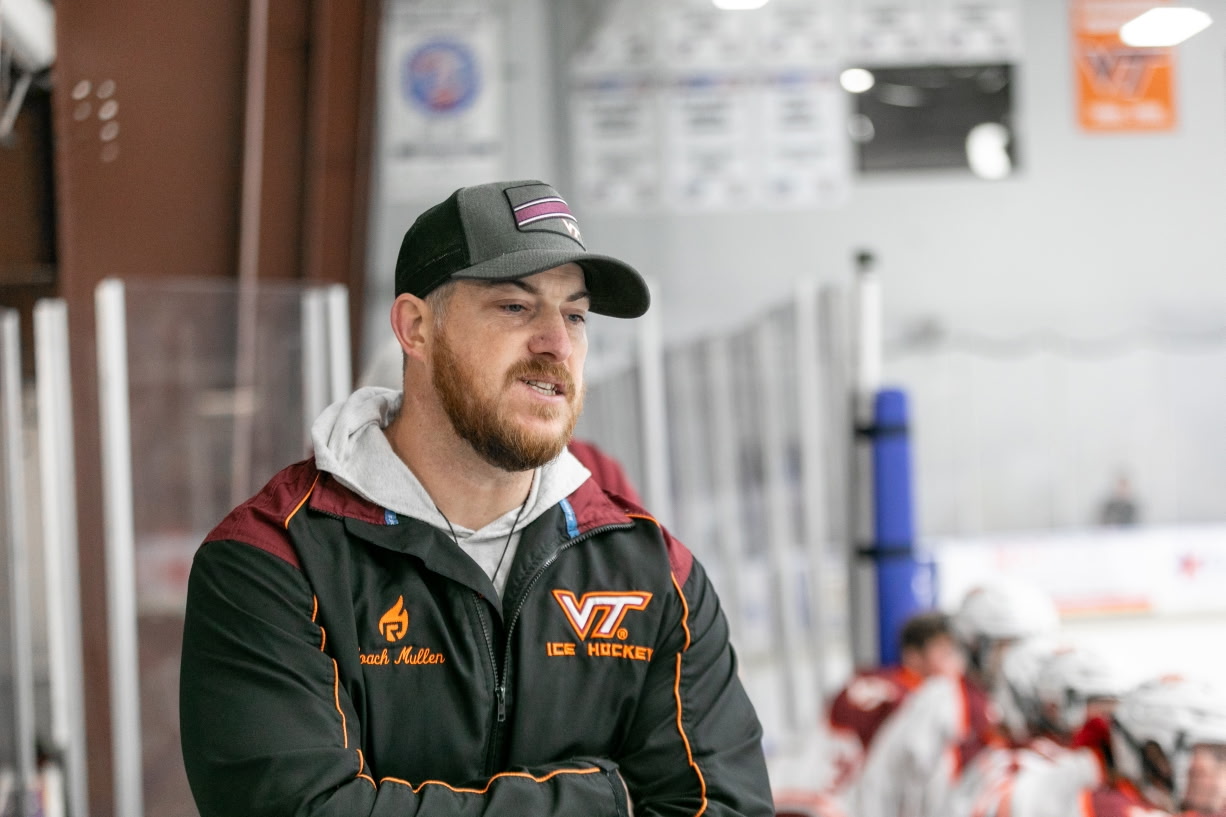 Joey Mullen behind the Virginia Tech hockey bench